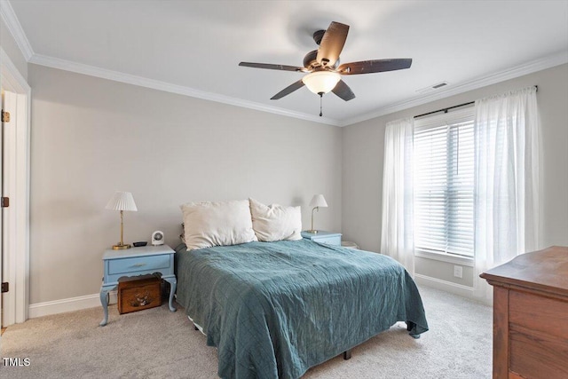 bedroom featuring crown molding, light colored carpet, baseboards, and visible vents