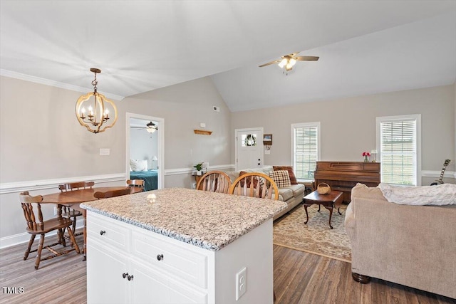 kitchen with light wood-style flooring, white cabinets, pendant lighting, and ceiling fan