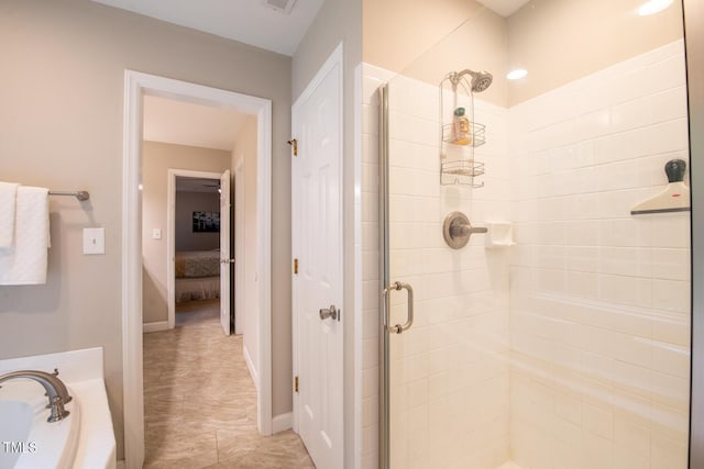 bathroom featuring a shower stall, a bath, and baseboards