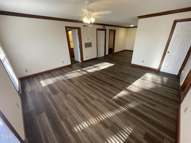 unfurnished living room with visible vents, baseboards, and dark wood-style flooring