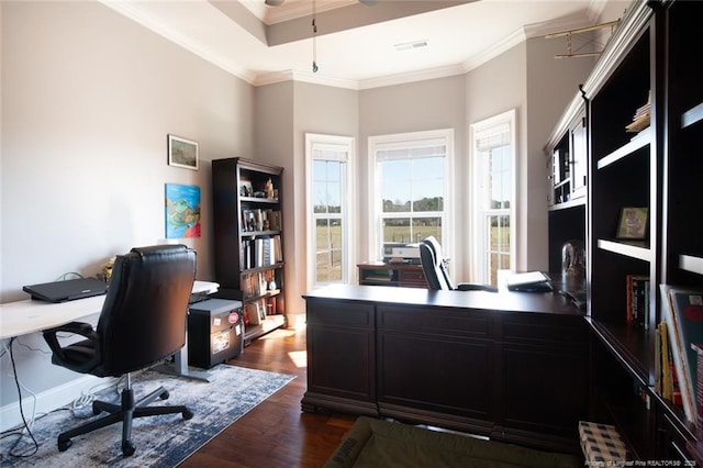 home office featuring visible vents, crown molding, dark wood-type flooring, a tray ceiling, and a ceiling fan