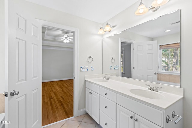 full bathroom featuring tile patterned flooring, visible vents, double vanity, and a sink