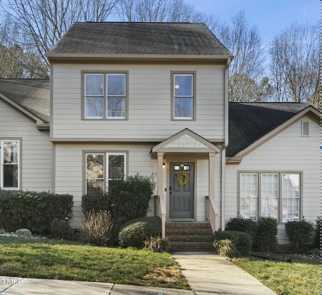 colonial house with a shingled roof