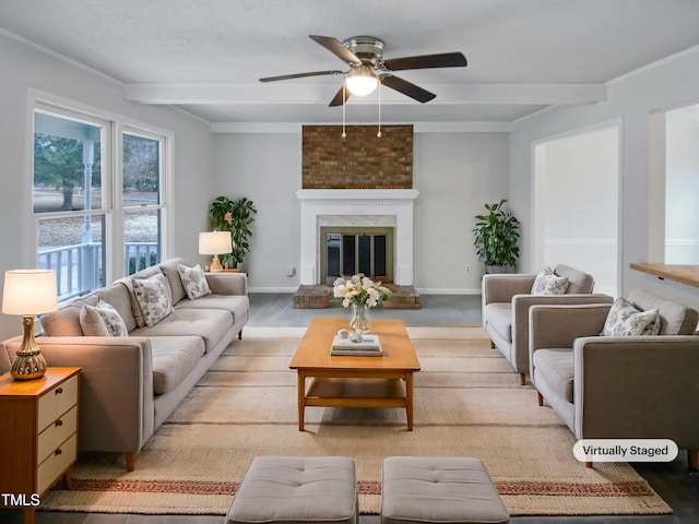 living area with baseboards, beam ceiling, light carpet, and a fireplace