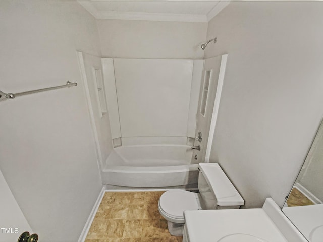 full bathroom with toilet, ornamental molding, shower / bath combination, baseboards, and vanity