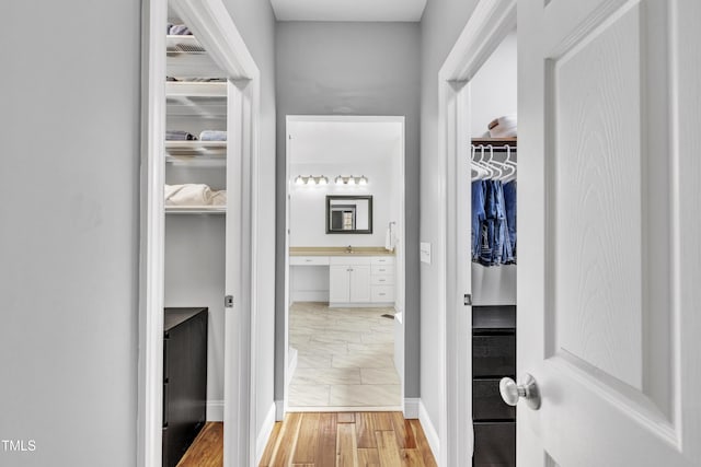 hall featuring light wood-type flooring