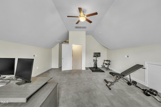 exercise room with a ceiling fan, visible vents, baseboards, vaulted ceiling, and carpet flooring