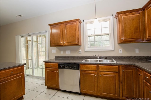440 Moss Pink Dr, Vass, NC 28394 - kitchen with a healthy amount of sunlight, a sink, dark countertops, and dishwasher