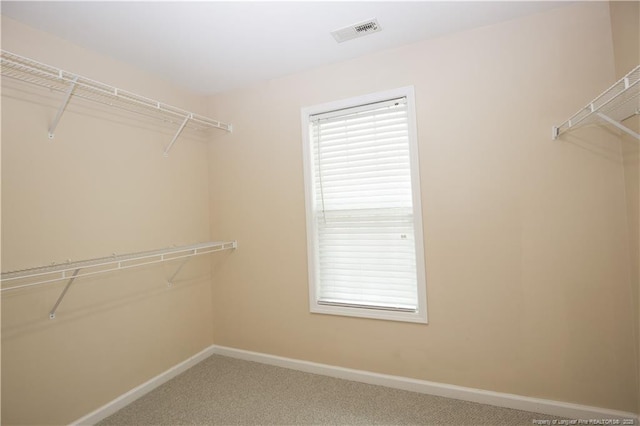 440 Moss Pink Dr, Vass, NC 28394 - spacious closet featuring carpet and visible vents