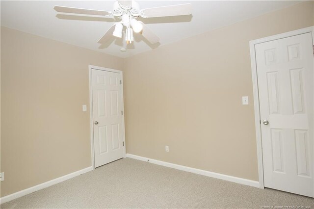 440 Moss Pink Dr, Vass, NC 28394 - empty room featuring baseboards, a ceiling fan, and light colored carpet