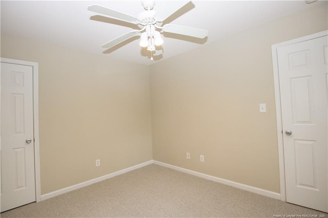 440 Moss Pink Dr, Vass, NC 28394 - unfurnished room featuring light colored carpet, ceiling fan, and baseboards