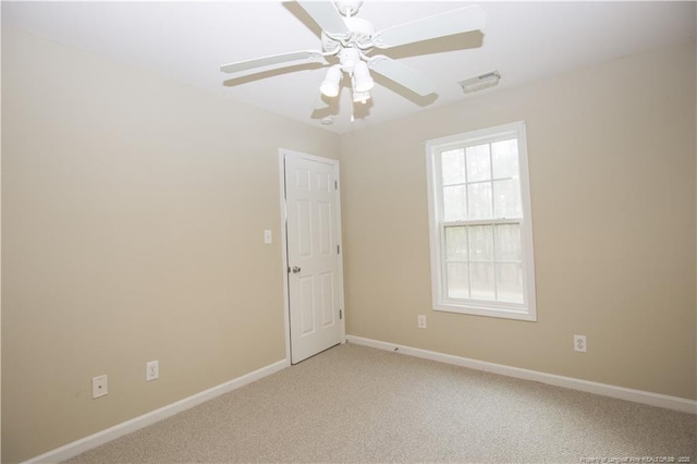 440 Moss Pink Dr, Vass, NC 28394 - empty room featuring baseboards, ceiling fan, visible vents, and light carpet