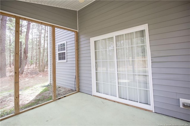 440 Moss Pink Dr, Vass, NC 28394 - unfurnished sunroom with a healthy amount of sunlight