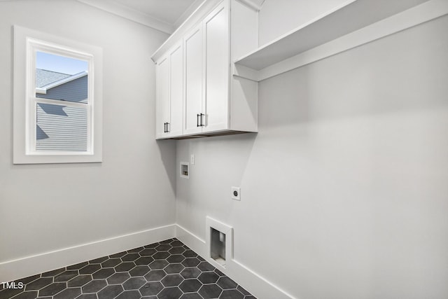 laundry area featuring baseboards, ornamental molding, washer hookup, cabinet space, and hookup for an electric dryer