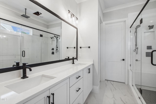 full bathroom featuring a shower stall, marble finish floor, and a sink