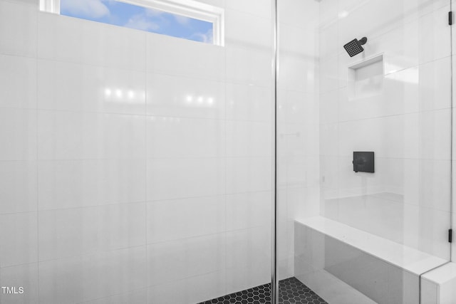 bathroom with a stall shower