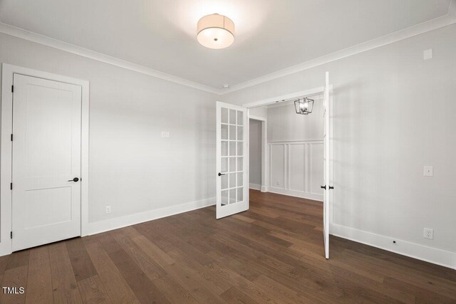 9004 Penny Rd, Raleigh, NC 27606 - unfurnished room featuring french doors, crown molding, and wood finished floors