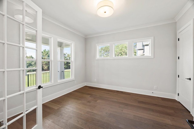 9004 Penny Rd, Raleigh, NC 27606 - empty room featuring ornamental molding and dark wood-style flooring
