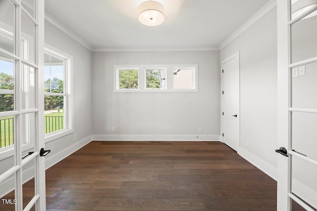 9004 Penny Rd, Raleigh, NC 27606 - unfurnished room with ornamental molding and dark wood-style flooring