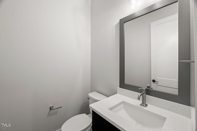 9004 Penny Rd, Raleigh, NC 27606 - half bathroom featuring toilet and vanity