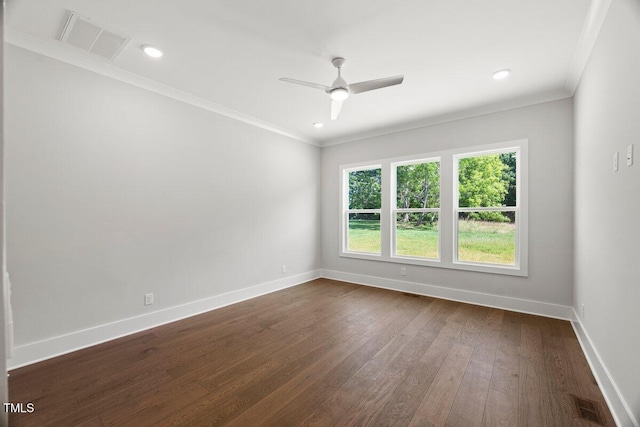 9004 Penny Rd, Raleigh, NC 27606 - empty room with dark wood finished floors, ornamental molding, a ceiling fan, and recessed lighting