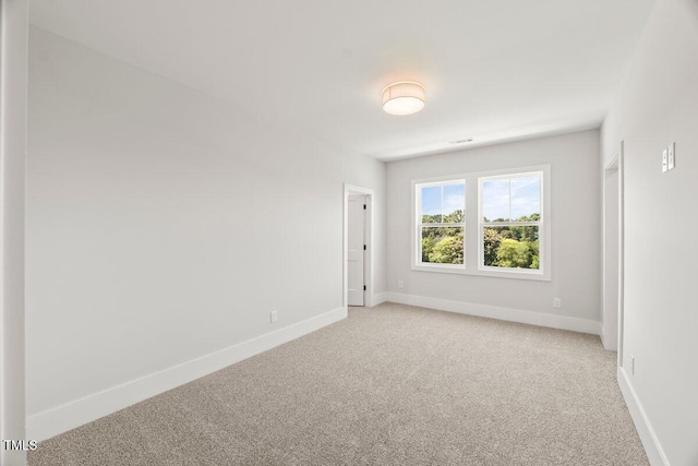 9004 Penny Rd, Raleigh, NC 27606 - unfurnished room featuring light colored carpet