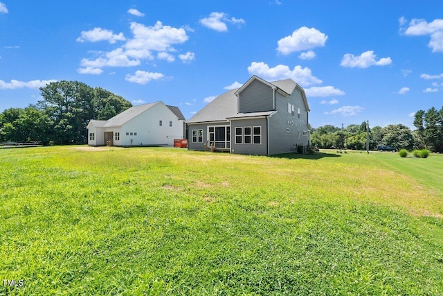 9004 Penny Rd, Raleigh, NC 27606 - rear view of property featuring a lawn