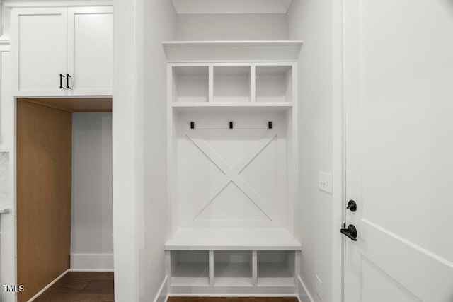 9004 Penny Rd, Raleigh, NC 27606 - mudroom with baseboards and dark wood-type flooring