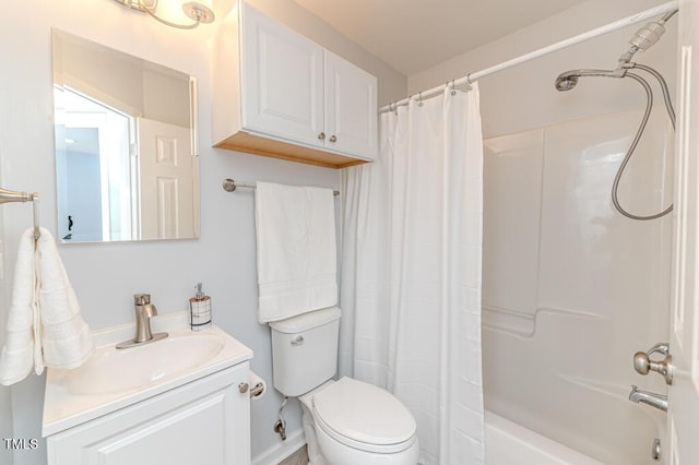 bathroom featuring vanity, toilet, and shower / bathtub combination with curtain