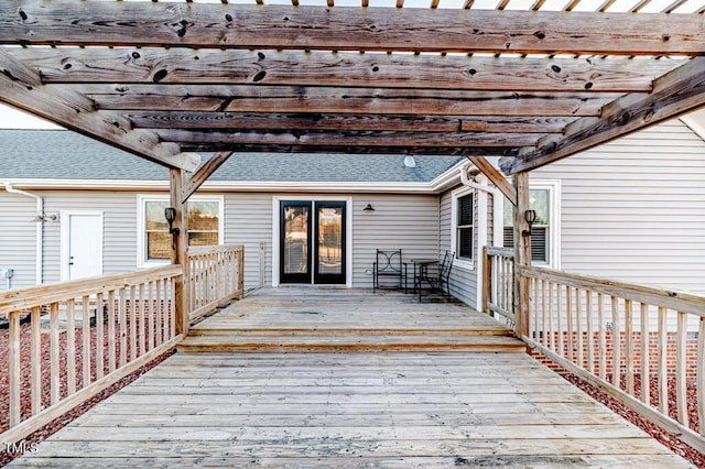 wooden deck featuring a pergola