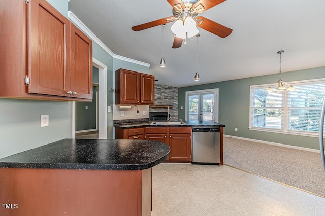 kitchen featuring baseboards, a peninsula, ornamental molding, stainless steel dishwasher, and dark countertops