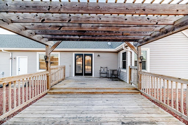 wooden terrace with a pergola