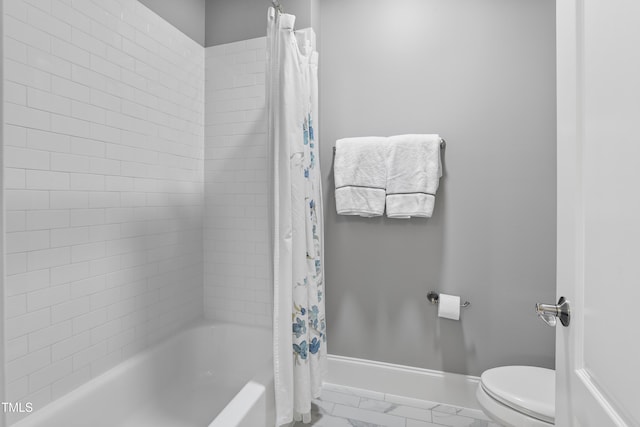 bathroom featuring baseboards, toilet, marble finish floor, and shower / bath combination with curtain