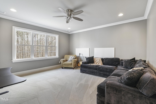 carpeted living room with visible vents, recessed lighting, crown molding, and ceiling fan