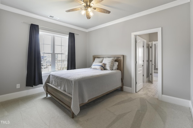 carpeted bedroom featuring visible vents, a ceiling fan, baseboards, and ornamental molding