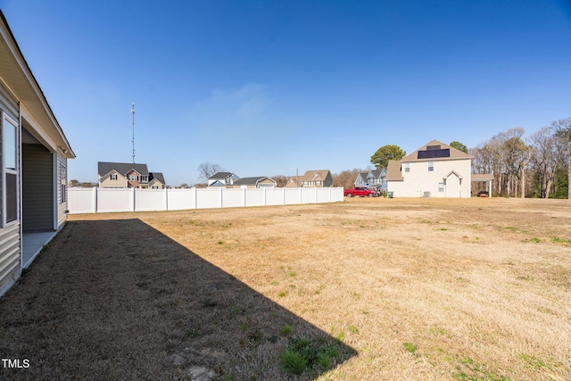 view of yard with fence