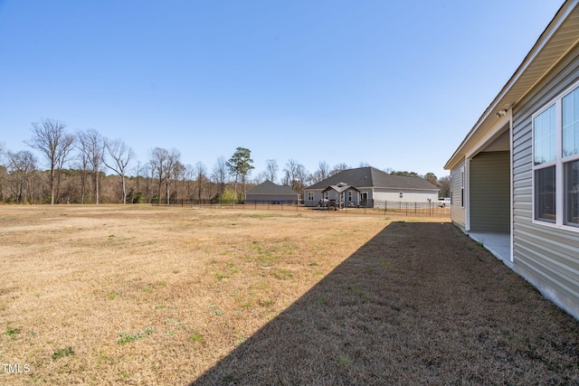 view of yard featuring fence