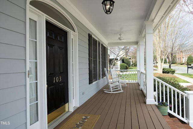 wooden terrace featuring a porch