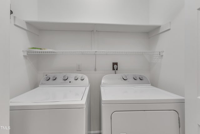 laundry area featuring laundry area and washing machine and dryer