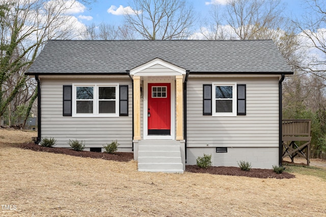 bungalow featuring roof with shingles and crawl space