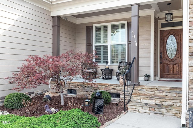 entrance to property with covered porch