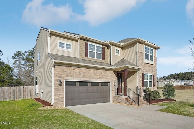 view of front of property with an attached garage, a front lawn, fence, stone siding, and driveway