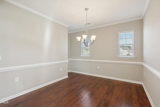 spare room with a notable chandelier, visible vents, baseboards, and wood finished floors