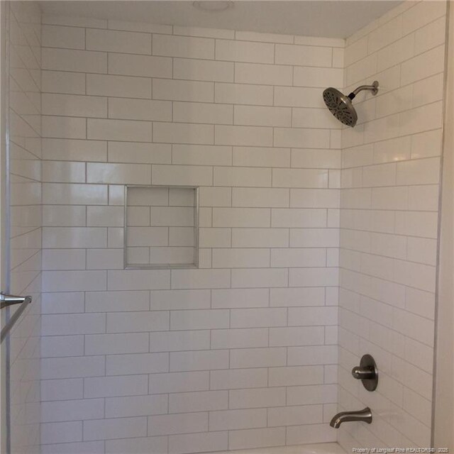 details with shower / tub combination