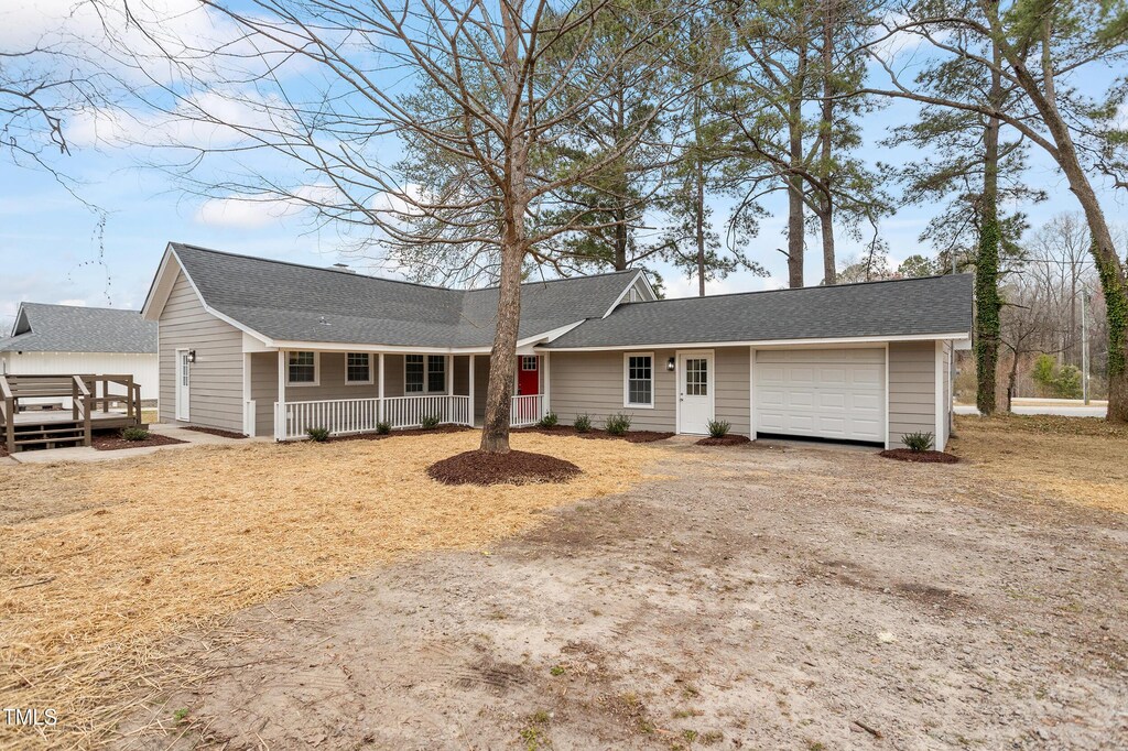 6215 Pine St, Bailey, NC 27807 - single story home with a garage, a porch, driveway, and a shingled roof