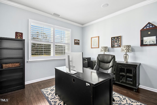 home office with hardwood / wood-style floors, crown molding, baseboards, and visible vents