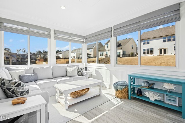 sunroom with a residential view