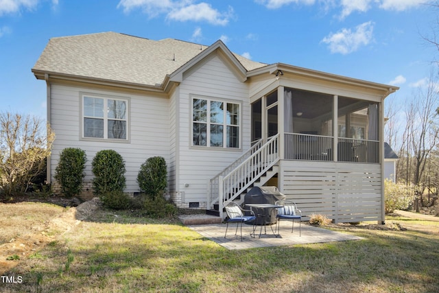 rear view of house with stairway, a patio area, a yard, a sunroom, and crawl space