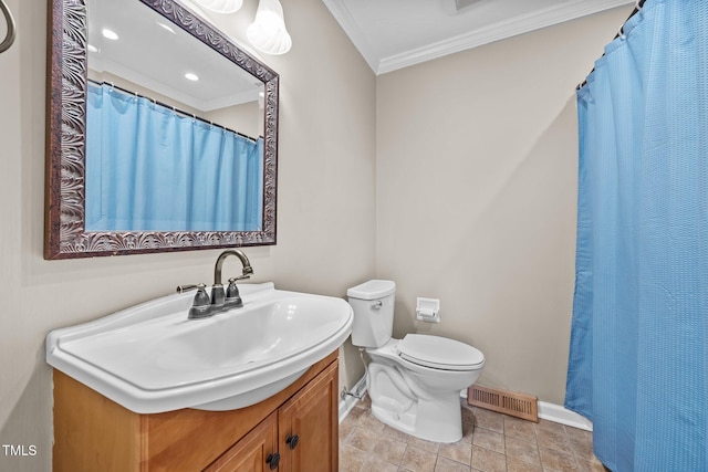 bathroom featuring visible vents, toilet, ornamental molding, baseboards, and vanity