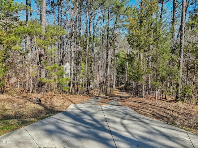 view of patio with a forest view